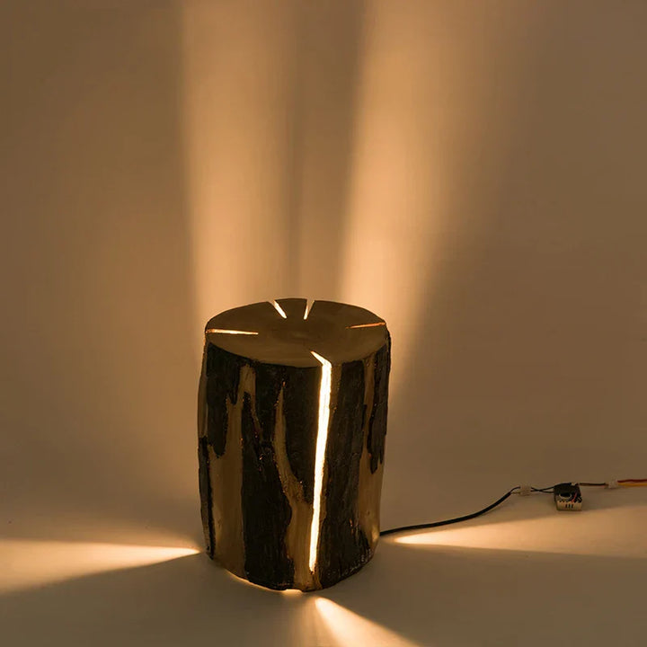 Creative LED garden light in tree trunk design for natural outdoor areas