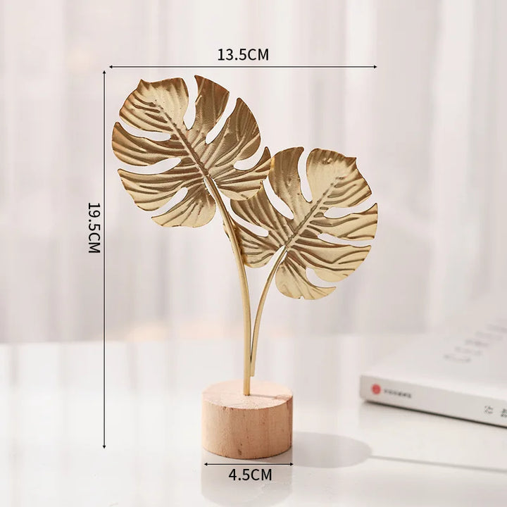 Metallene Ginkgo-Dekoration mit goldener Oberfläche