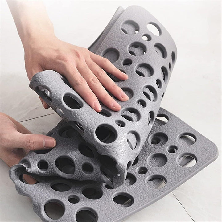 Non-slip, antibacterial shower mat with suction cups for a secure hold