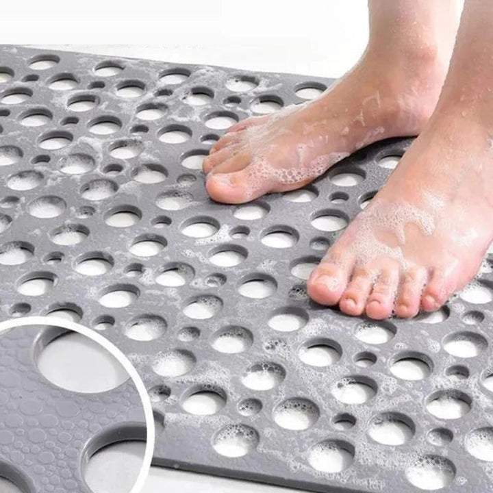 Non-slip, antibacterial shower mat with suction cups for a secure hold