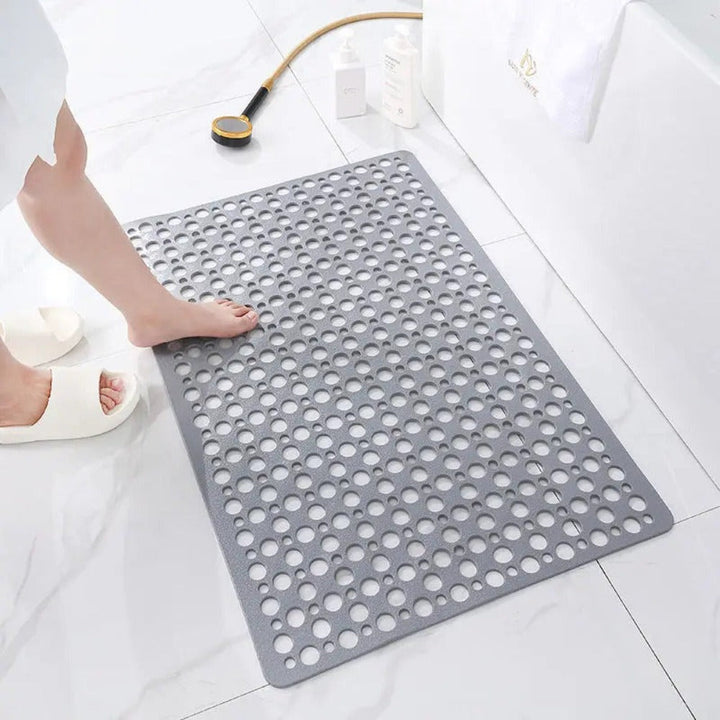 Non-slip, antibacterial shower mat with suction cups for a secure hold