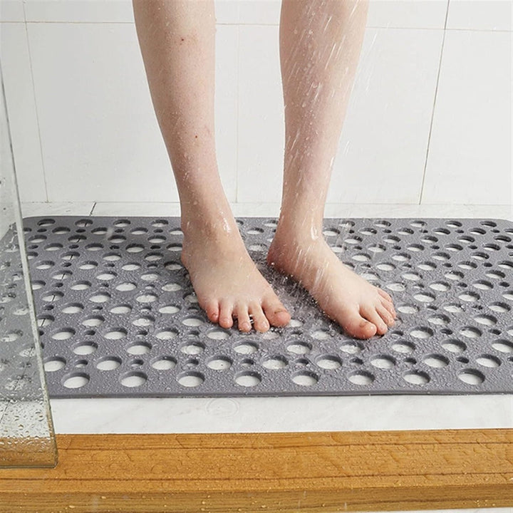 Non-slip, antibacterial shower mat with suction cups for a secure hold