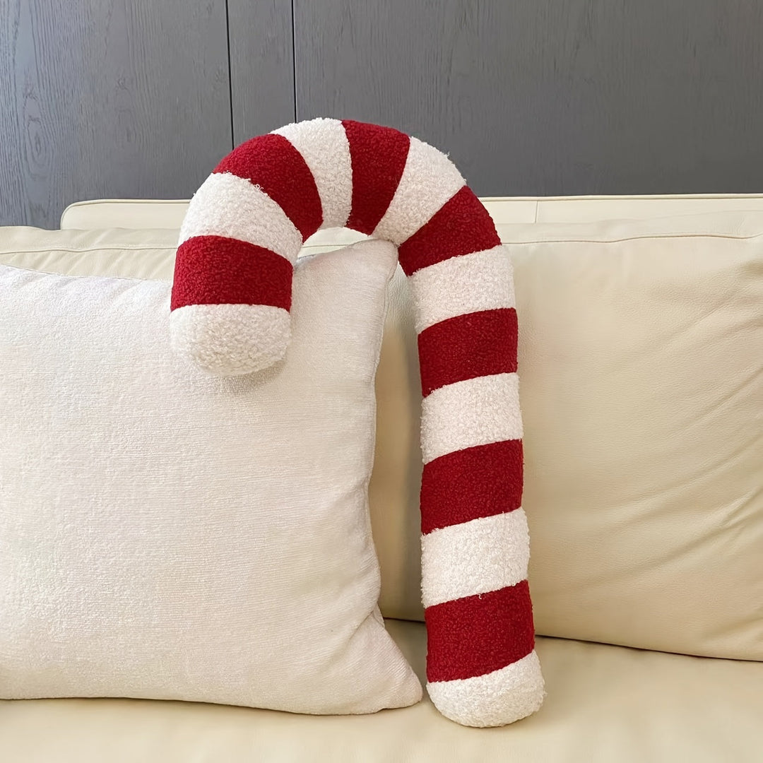 Detailansicht des weichen Plüschbezugs am Zuckerstangenkissen